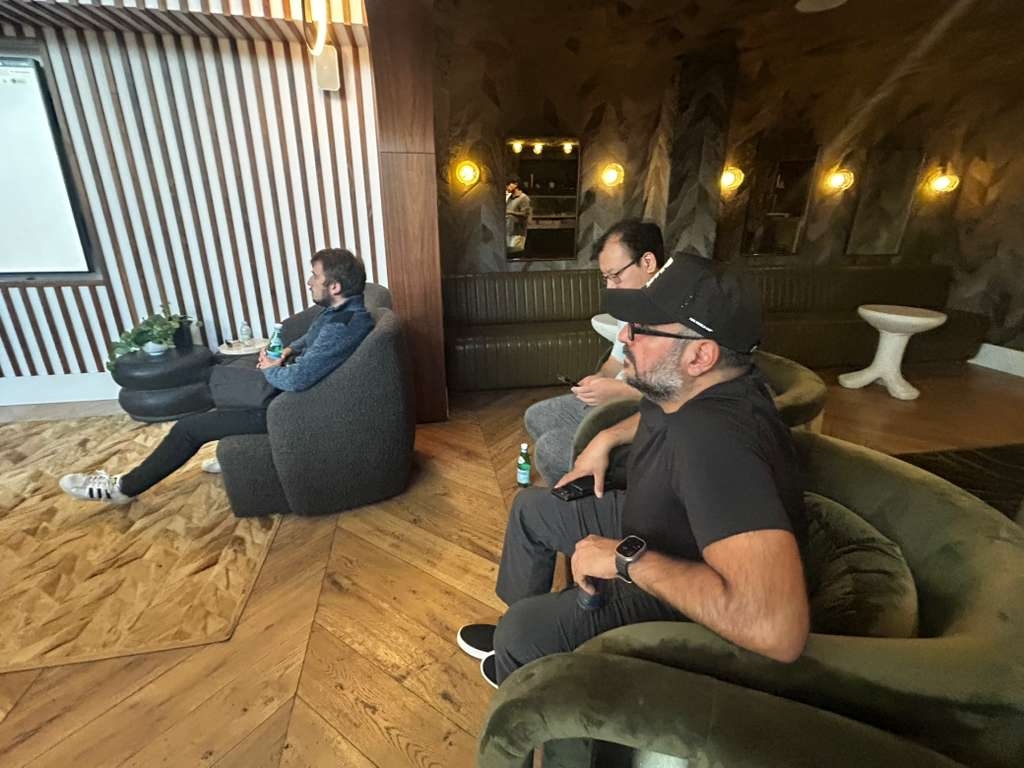 Small group conversation on couches