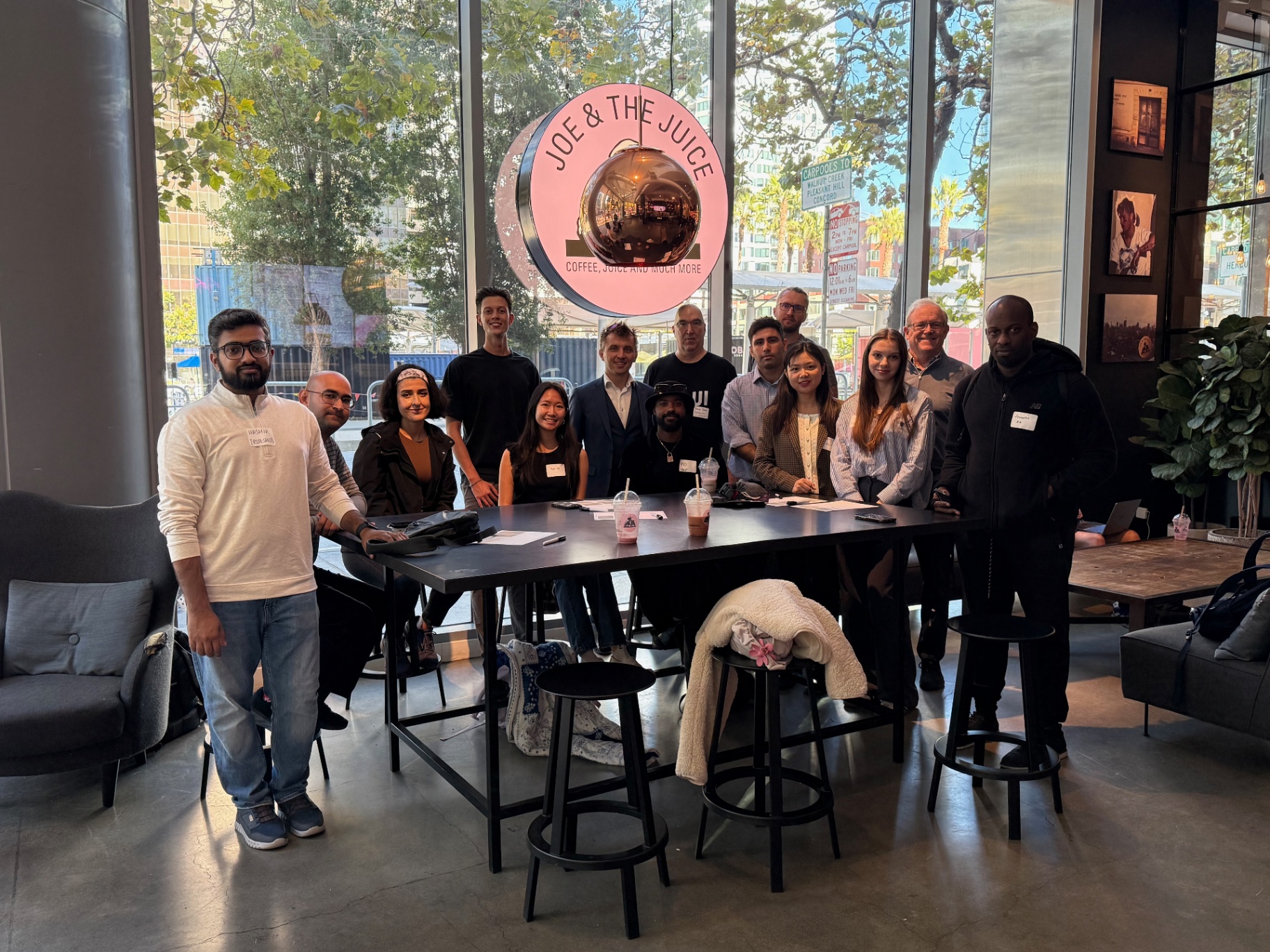 Founders group photo at Joe & The Juice with sunlit windows