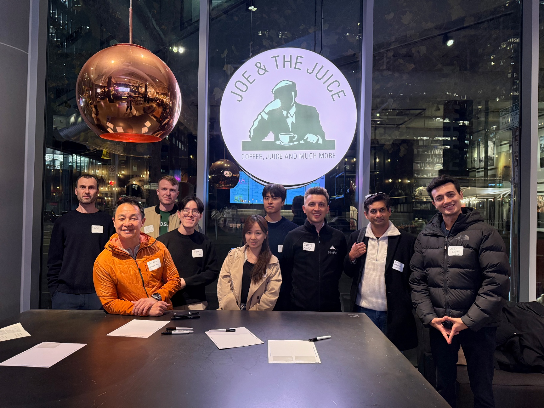 Founders lined up at the venue with copper pendant