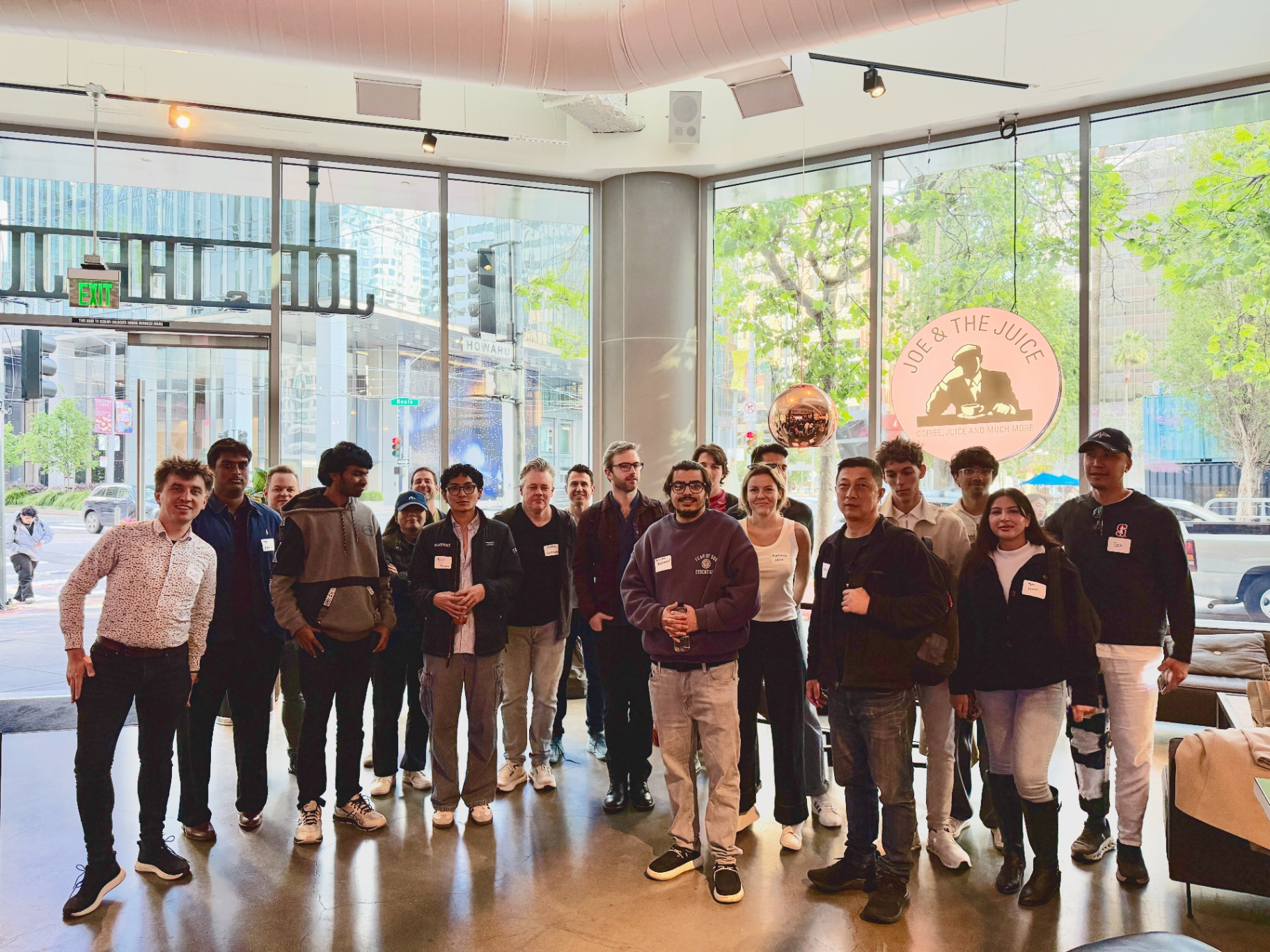 Wide-angle group of founders in the SF venue
