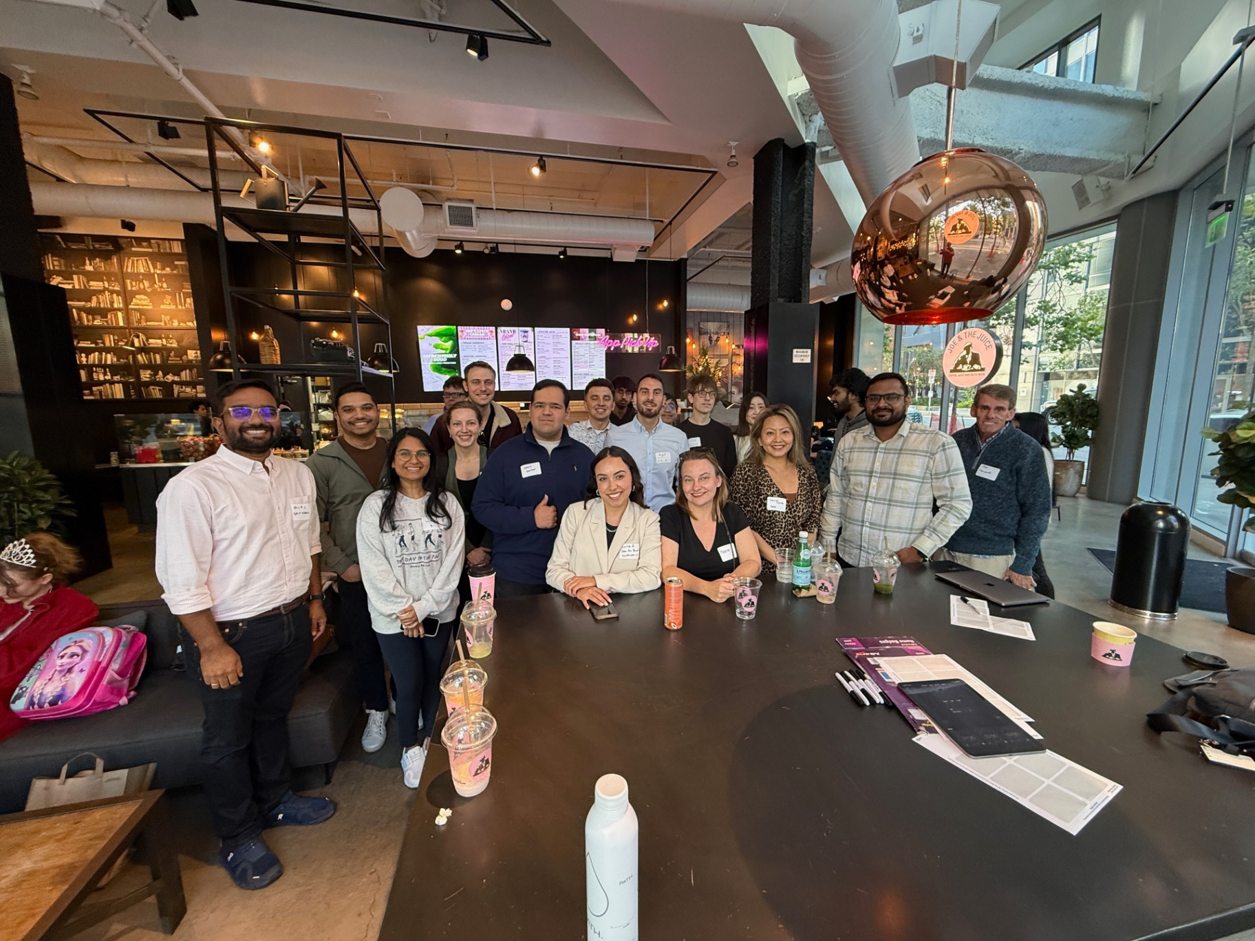 Group of founders around the bar table at Founders Gatherings